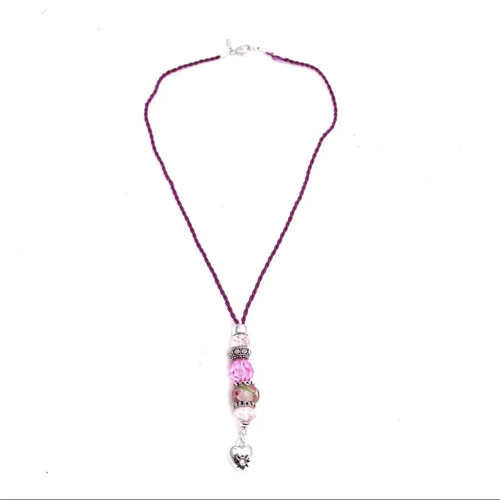 Necklace with heart charm and beads in pink and silver